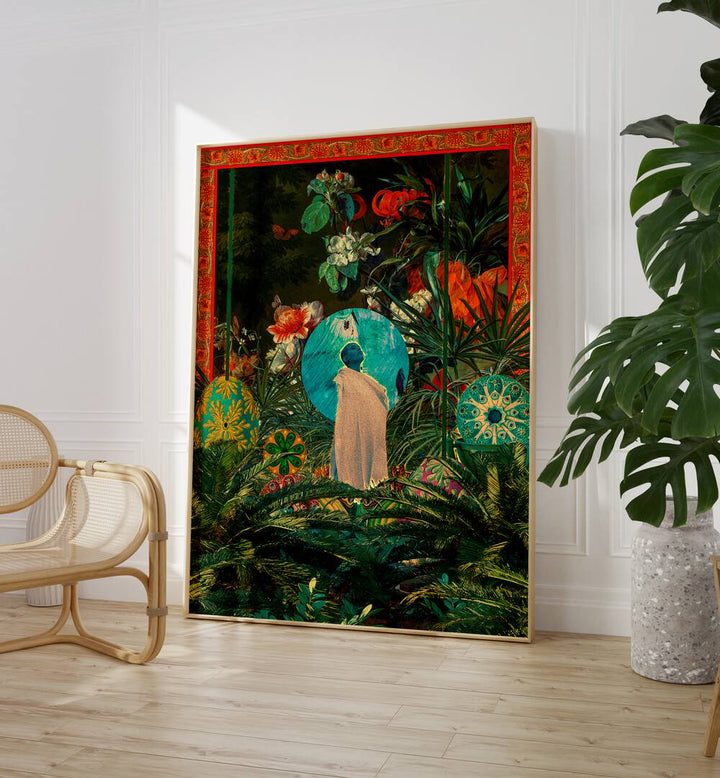 Oasis Queen By Cosmo Zach Surreal Art Prints Surrealism in Oak Wood Plain Frame placed on the floor between a chair and plant