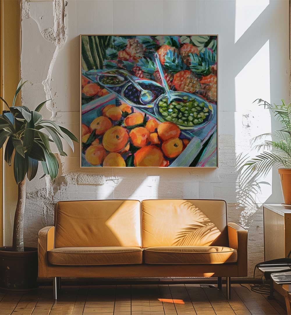Sunlit living room with framed OLIVE LOVER , KITCHEN POSTERS showing olives, oranges and herbs above leather sofa