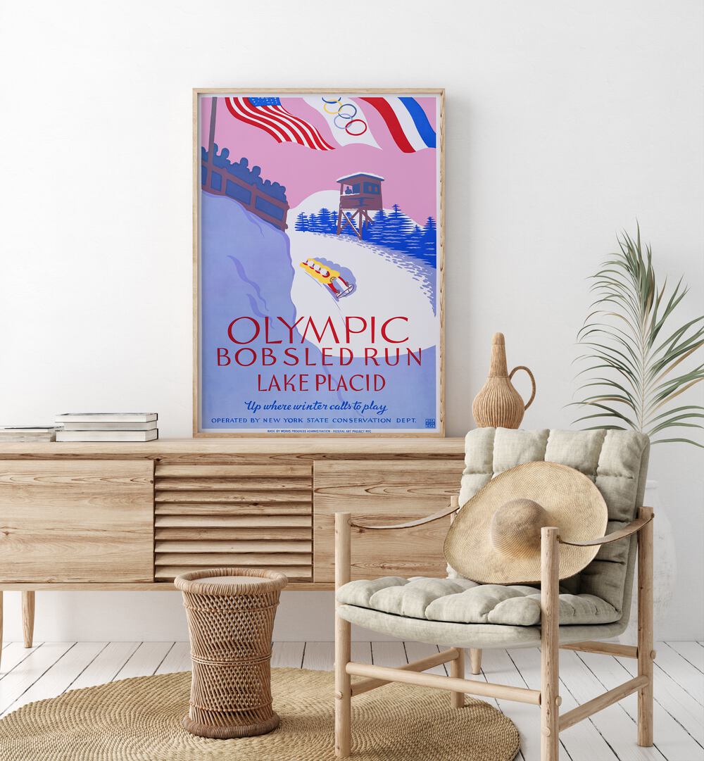 Olymic Bobsled Run Retro Vintage Travel Vintage Travel Posters in Oak Wood Plain Frame on a console table beside a plant