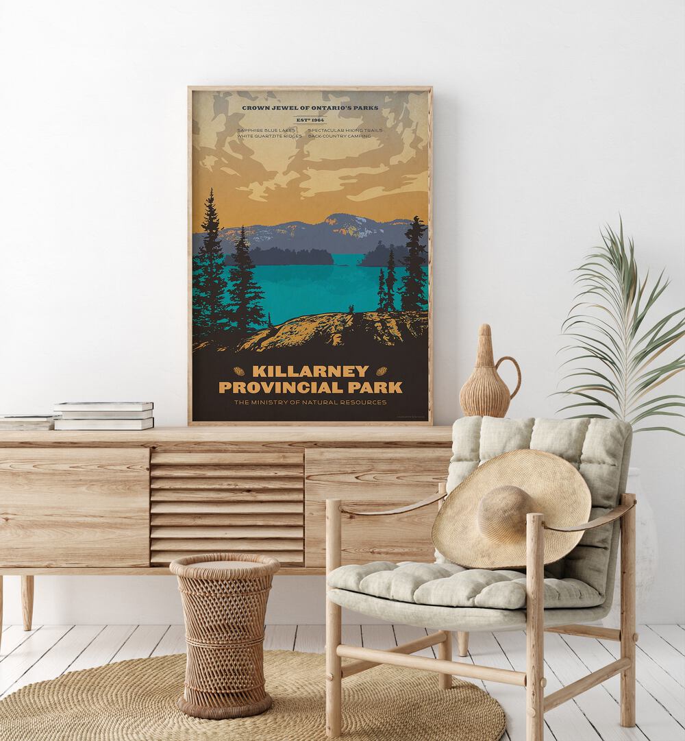 Ontario Retro Vintage Travel Vintage Travel Posters in Oak Wood Plain Frame on a console table beside a plant