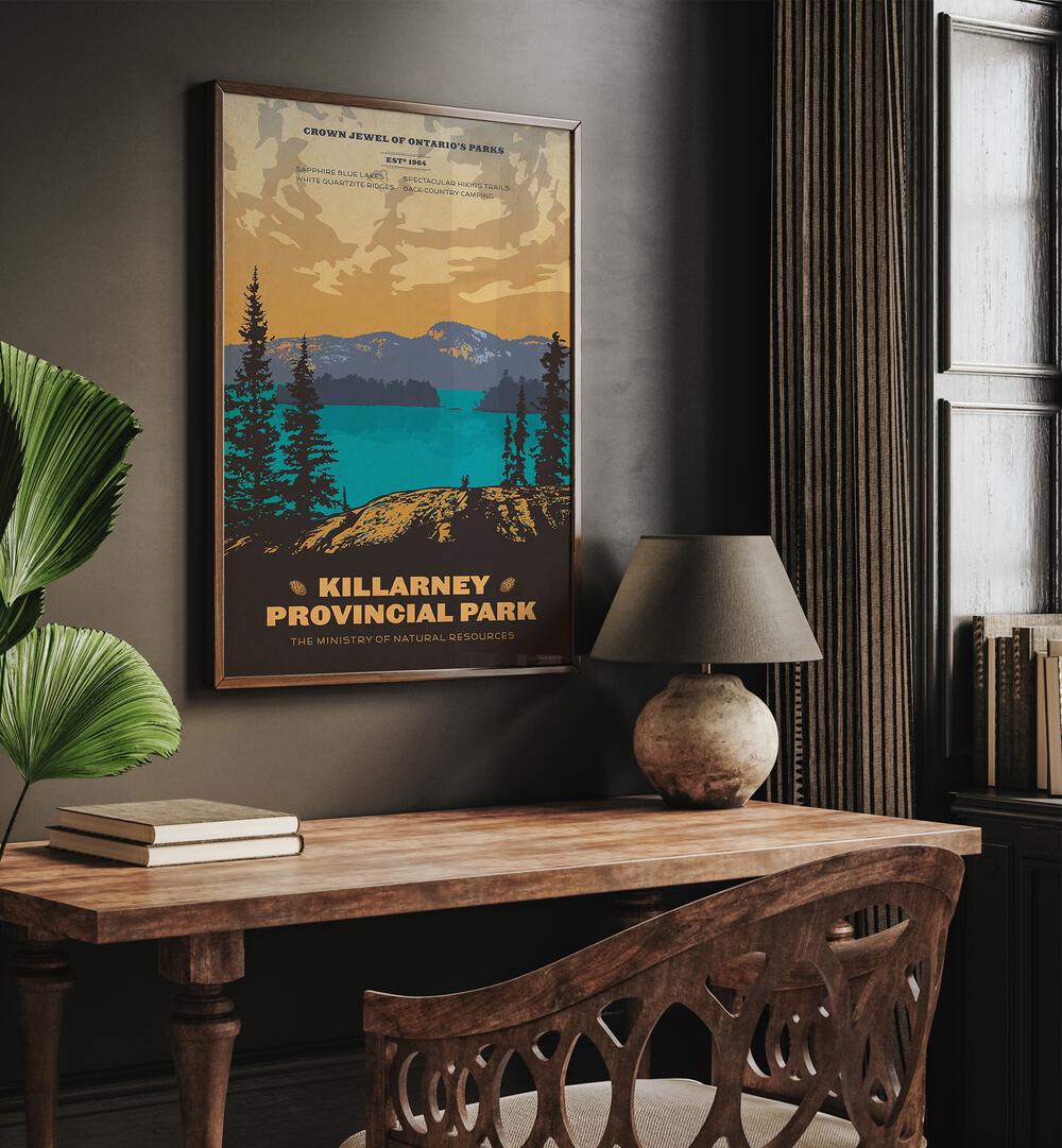 Ontario Retro Vintage Travel Vintage Travel Posters in Dark Wood Plain Frame on a wall above a study table beside a plant