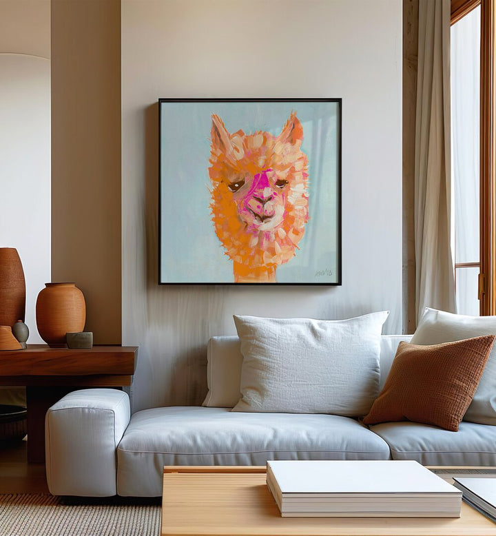 Orange Alpaca By Ania Zwara Kids Room Paintings Kids Room Wallart in Black Plain Frame placed on a Beige Colored Wall near a White Sofa in the Living Room