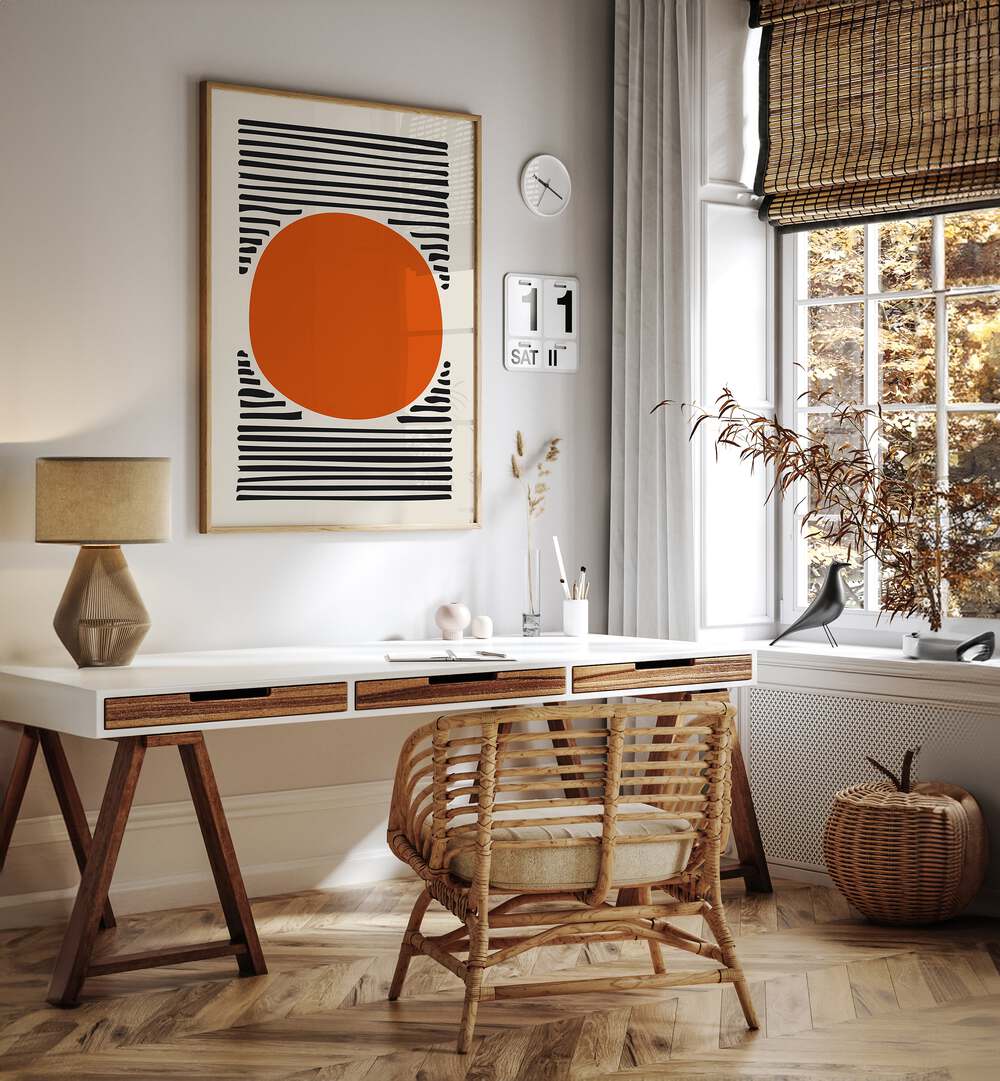 Orange Sun Abstract Paintings Abstract Art Prints in Oak Wood Plain Frame placed on a White Colored Wall near a Study Table in a Workspace in the Drawing Room