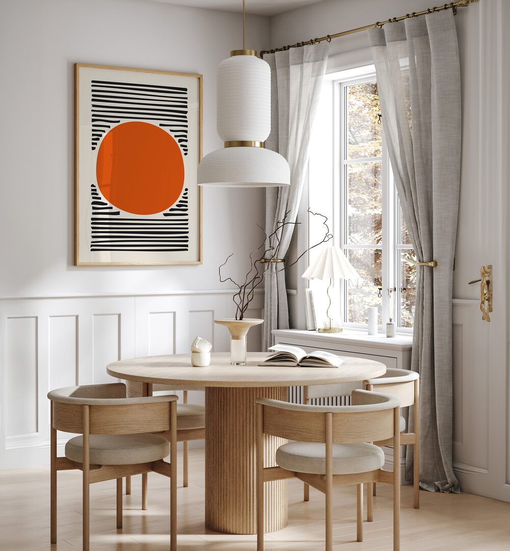 Orange Sun Abstract Paintings Abstract Art Prints in Oak Wood Plain Frame placed on a White Colored Wall near a Dining Table in the Dining Room