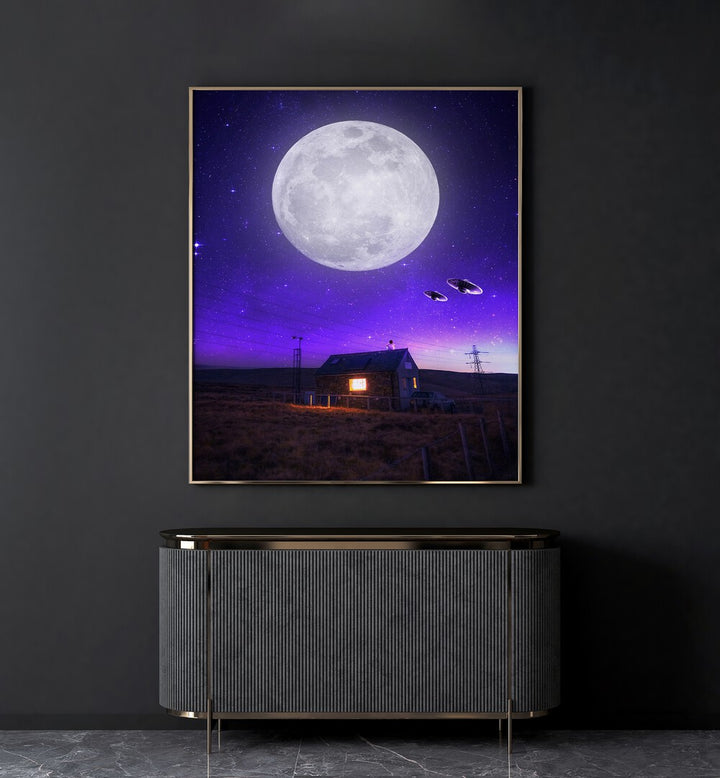 Orb Of Night By Ritvik Takkar Surreal Art Prints in Gold Plain Frame placed on a Dark Grey Colored Wall above a Console Table in the Drawing Room