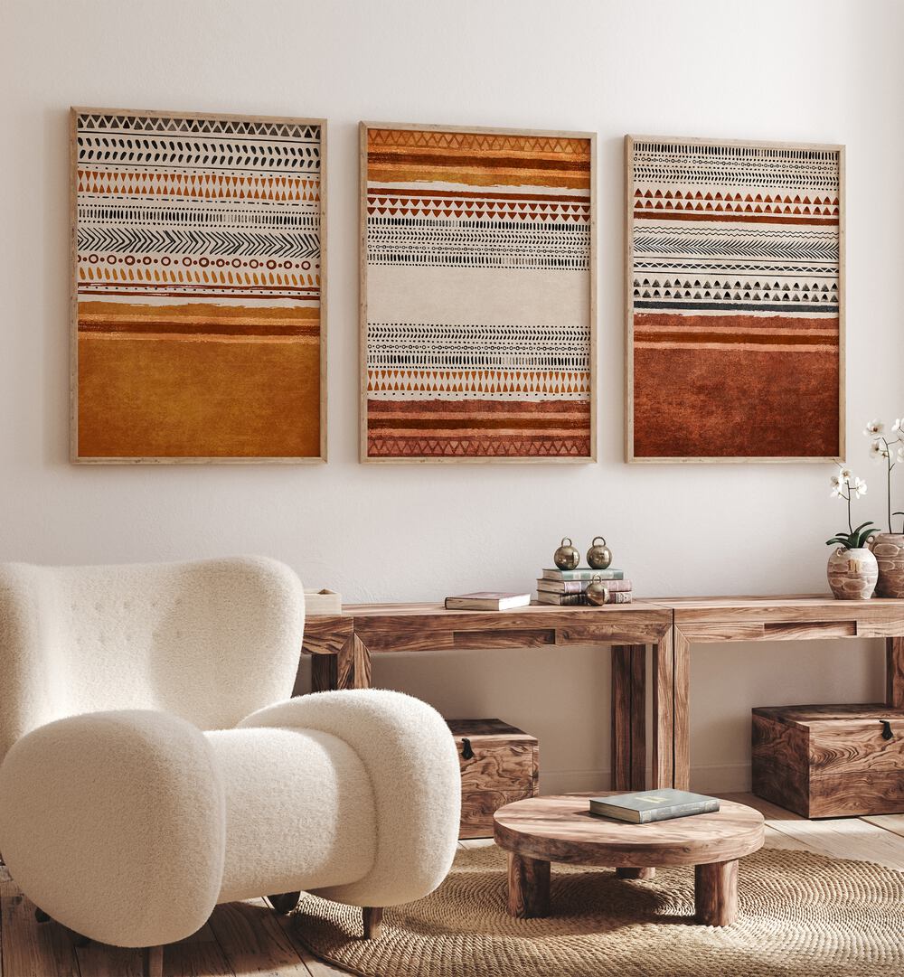 Organic Rug Patterns Set Of 3 Paintings in Oak Wood Plain Frame placed on a wall behind tables 