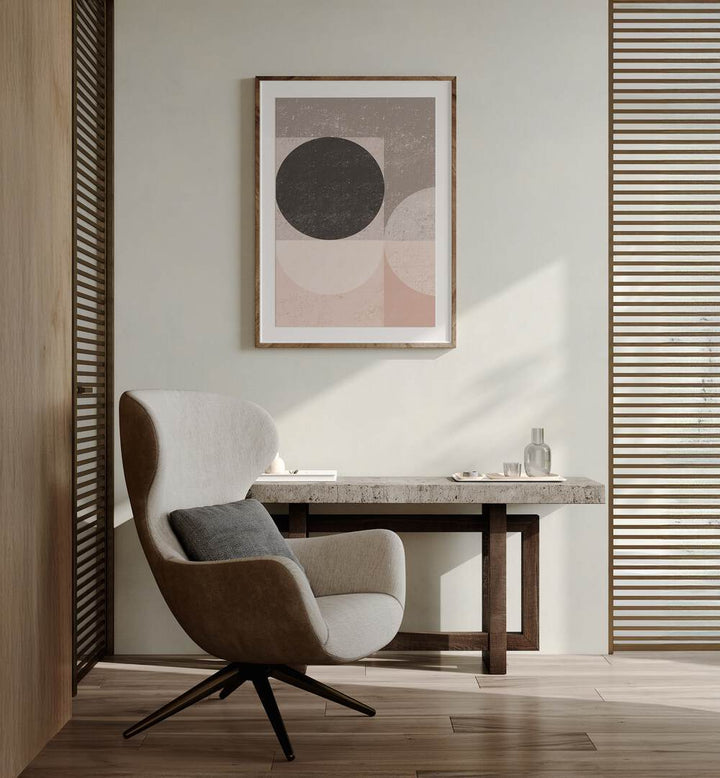 Stylish interior with PASTEL GEO, GEOMETRIC ART PRINTS framed above a modern desk and cozy chair.