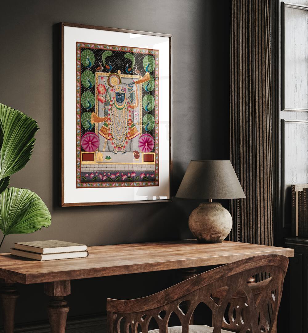 Pichwai Art II Indian Art Painting Artwork in oakwood frame with mount above a study table on brown wall for study room 