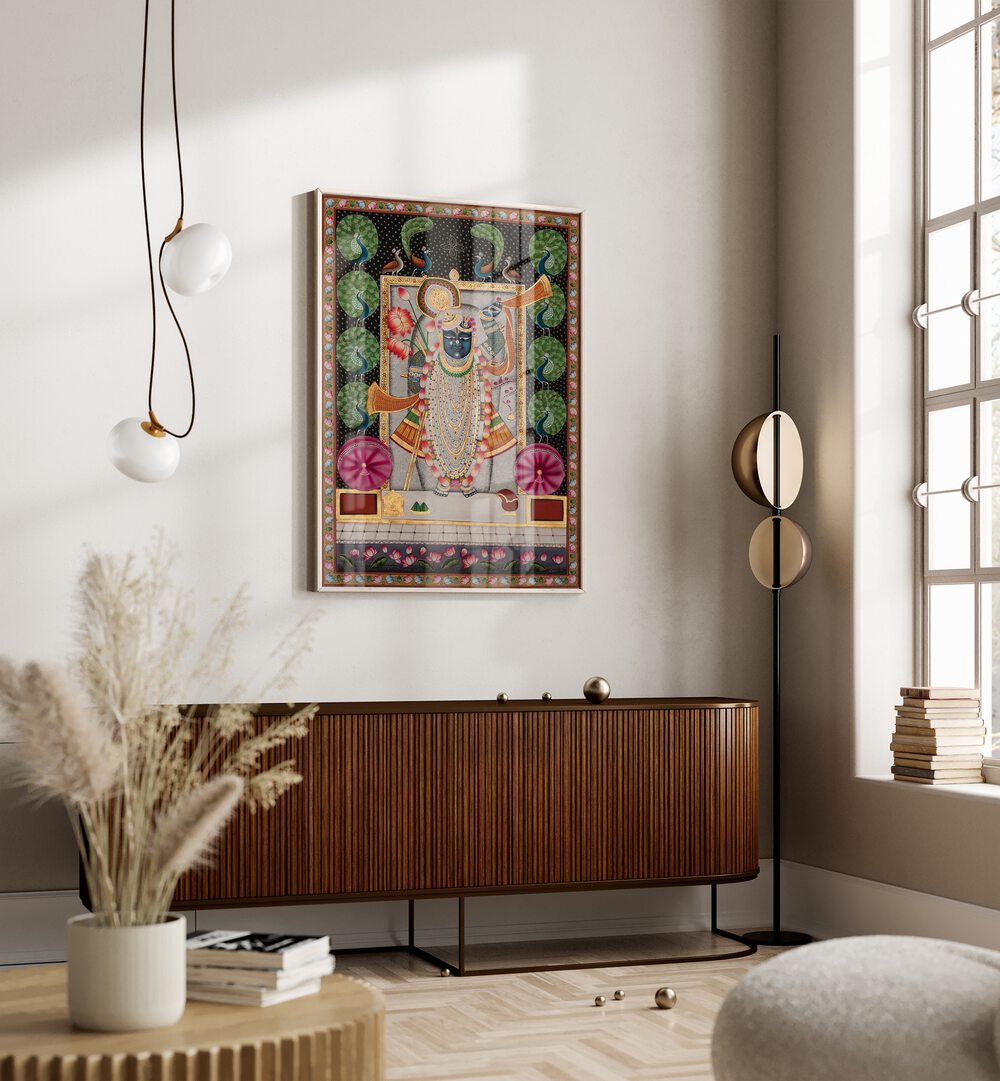 Pichwai Art II Indian Art Painting Artwork in oakwood floater frame above brown console table on white wall 