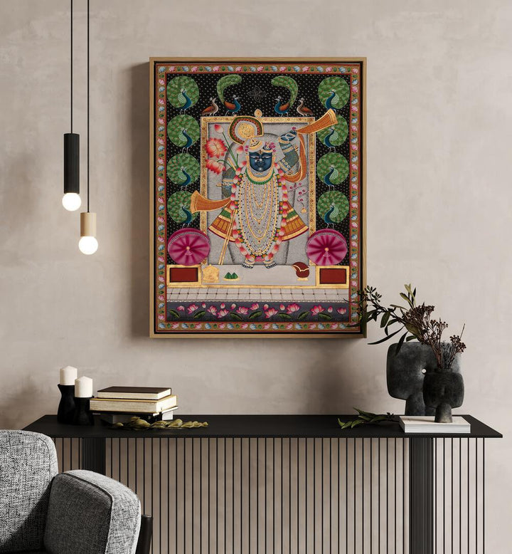 Pichwai Art II Indian Art Painting Artwork in Oak Wood Floater Frame placed on cream colored wall above a console table