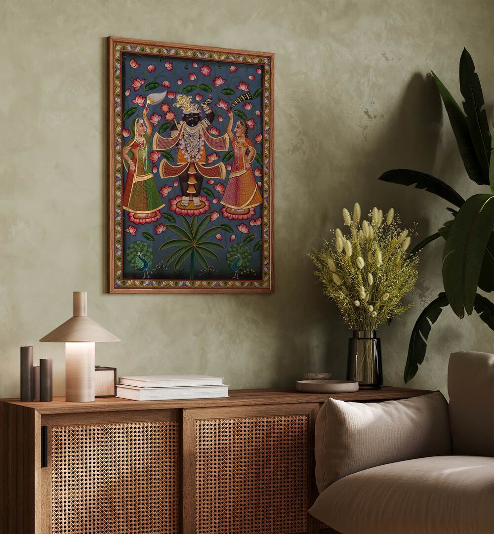 Pichwai Art V Indian Art Painting Artwork in oakwood floater frame on green wall above a console table