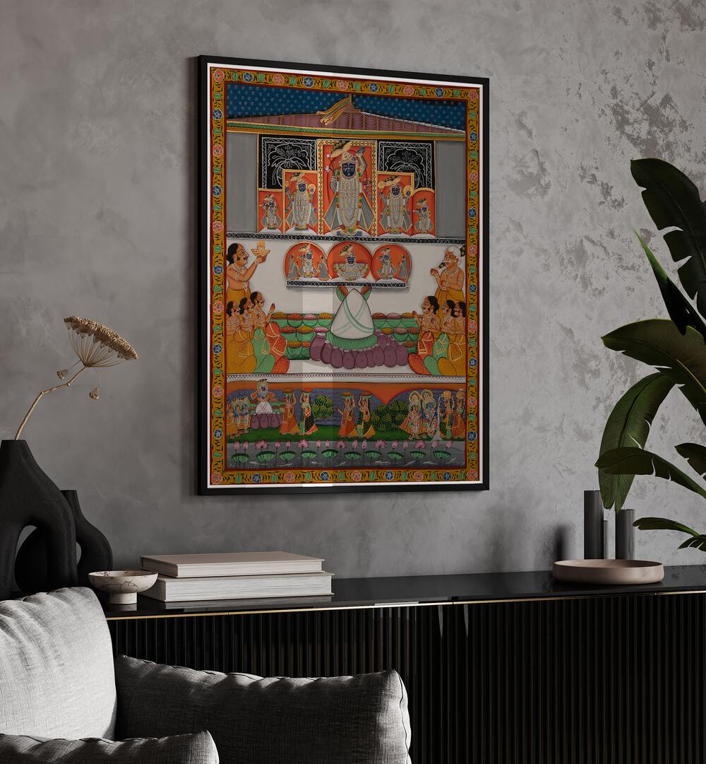 Pichwai II Indian Art Painting Artwork in Black Plain Frame placed on a Grey Textured wall above a Black Console Table