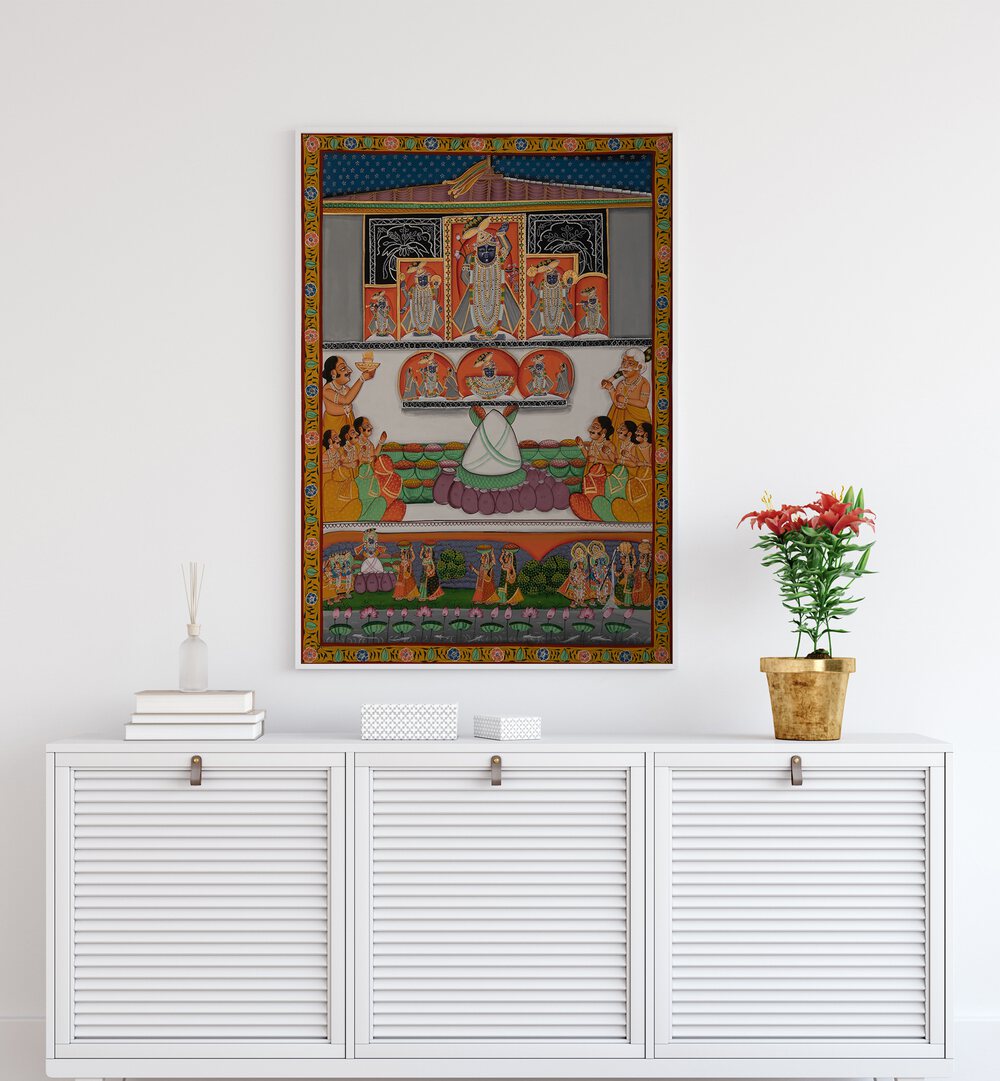 Pichwai II Indian Art Painting Artwork in White Plain Frame placed on a White Wall above a White Cabinet / Console table