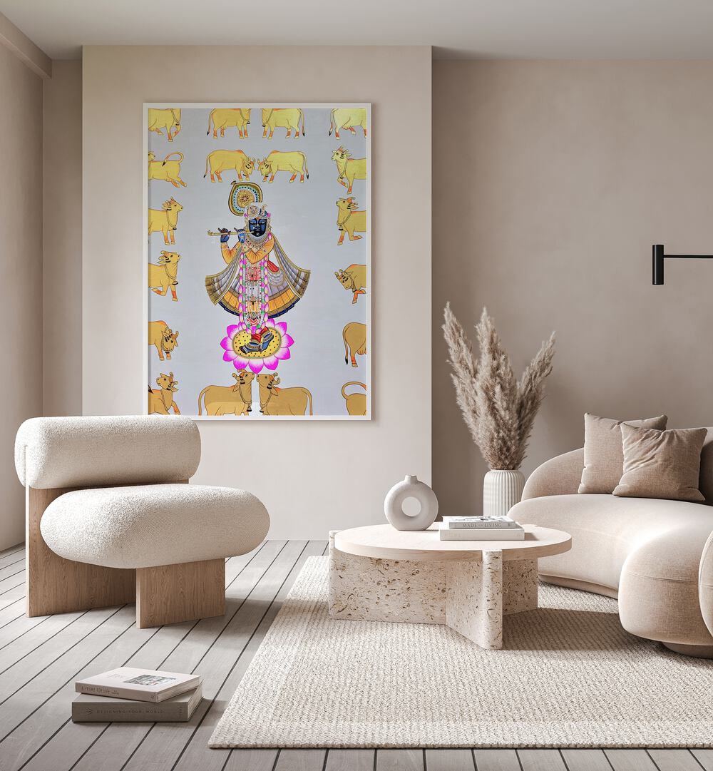 Pichwai Paintings II Indian Art Painting Artwork in White Plain Frame placed on a Beige Colored Wall Near Beige Colored Sofa Set in the Living Room