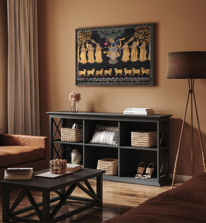 Pichwai Paintings VII Indian Art Painting Artwork in Black Plain Frame placed on a Burnt Brown Wall above a Black Console Table in the Living Room