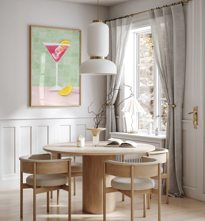Stylish dining area featuring PINK COCTAIL II, BAR & CAFE ART with a vibrant cocktail print and modern decor.