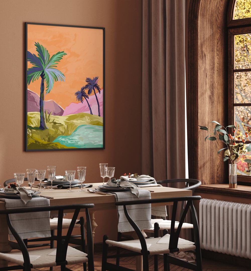 Palmtrees By Goed Blauw Landscape Art Prints in Black Plain Frame placed on a Brown Colored Wall near a Dining Table in the Dining Room