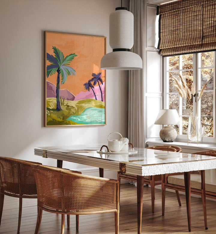 Palmtrees By Goed Blauw Landscape Art Prints in Oak Wood Plain Frame placed on a Cream Colored Wall near a Dining Table in the Dining Room