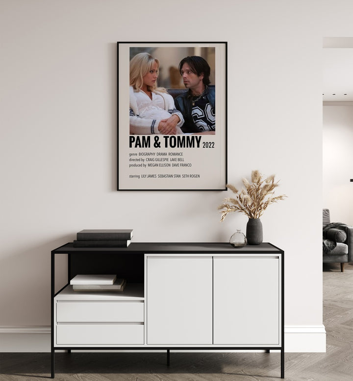 Pam Tommy 2022 Movie Posters in Black Plain Frame hanging on wall above console table