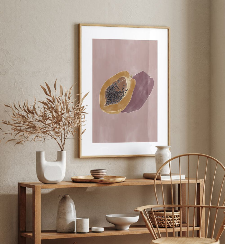 Papaya By Ivy Green Kitchen Art Prints in Oak Wood Frame With Mount on a beige wall above a table