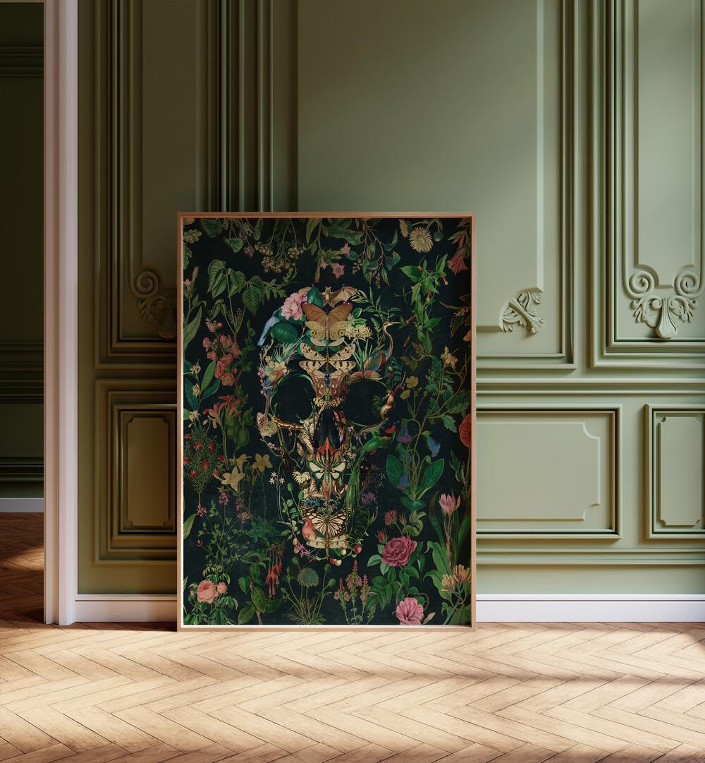 Papillon Skull Botanical Art Prints Floral Paintings in Oak Wood Plain Frame placed on the floor beside a window