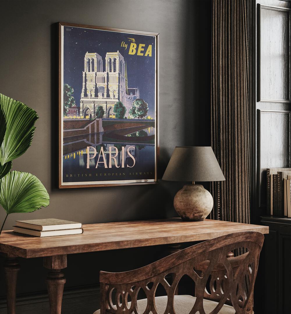 Paris-British European Airways  Vintage Travel Posters in Dark Wood Plain Frame placed on a wall behind a study table