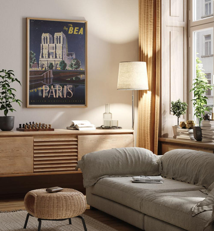 Paris-British European Airways  Vintage Travel Posters in Oak Wood Plain Frame placed on a wall behind a console table