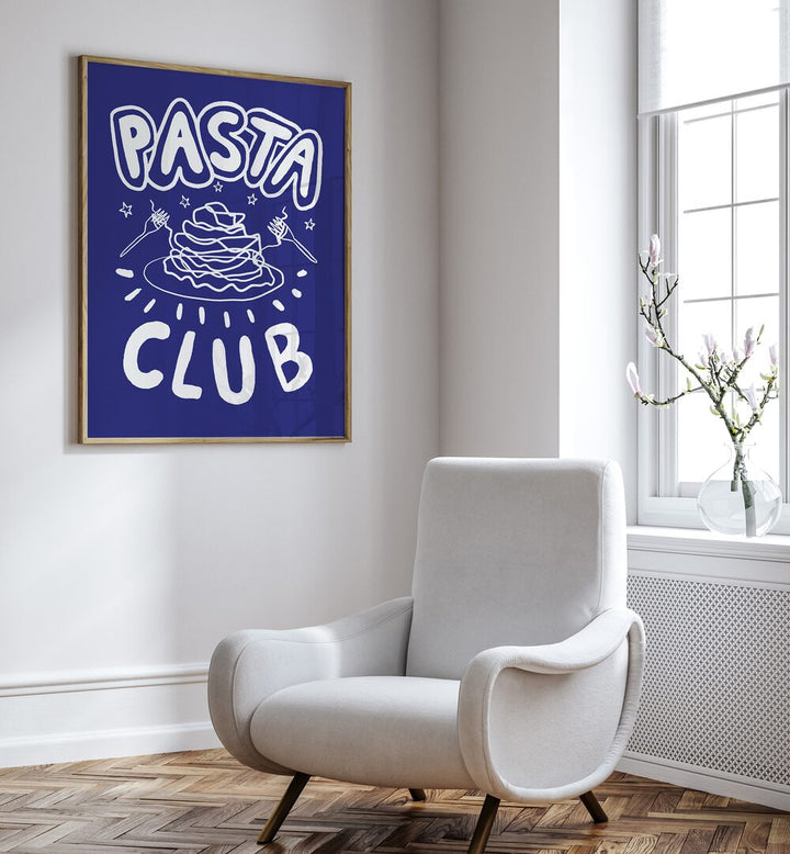 Pasta Club by Studio Dolci Kitchen Posters in Oak Wood Plain Frame placed on a wall beside a sofa and a window