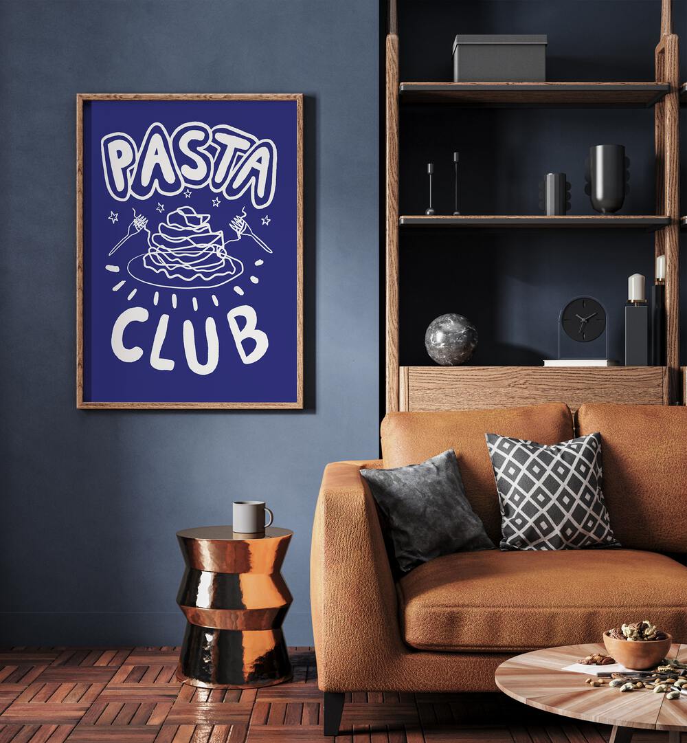 Pasta Club by Studio Dolci Kitchen Posters in Oak Wood Plain Frame placed on a wall beside a sofa