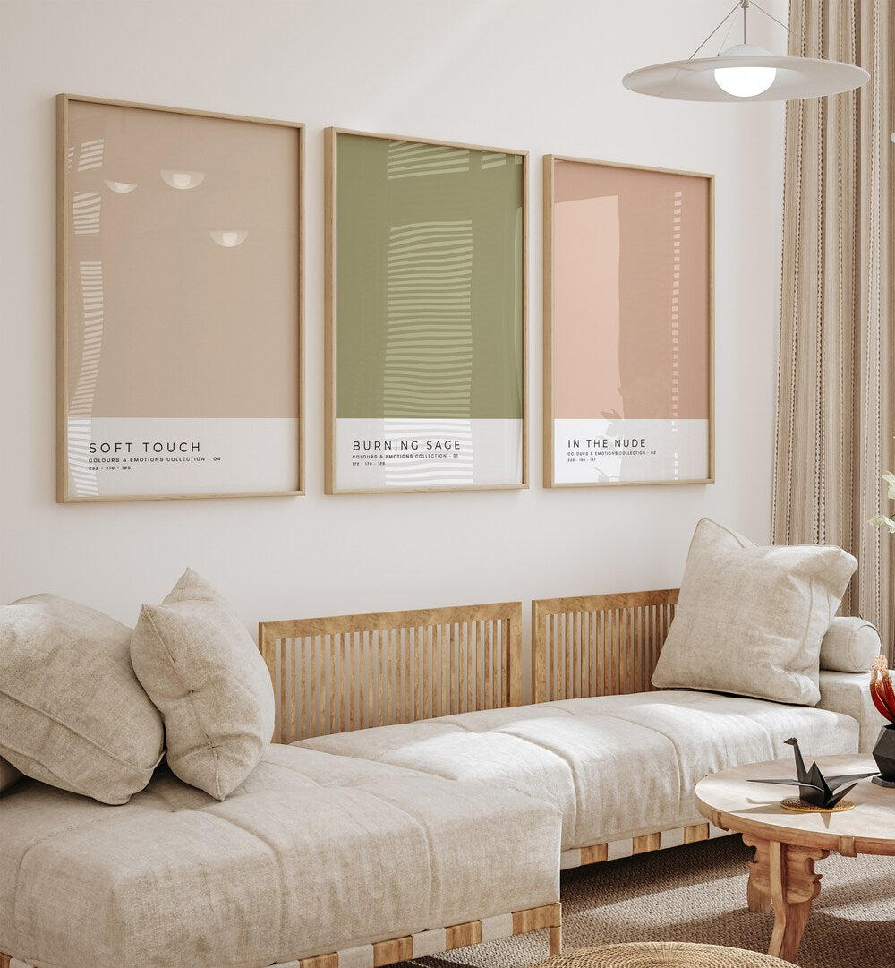 Pastel Colors Vol-I Set Of 3 Paintings in Oak Wood Plain Frame placed on a white wall behind a sofa for living room