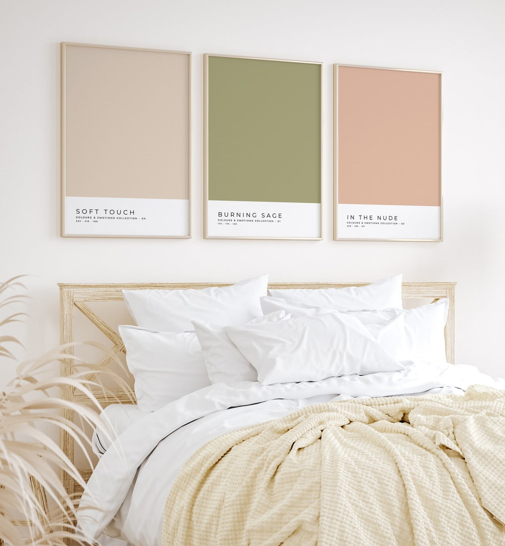 Pastel Colors Vol-I Set Of 3 Paintings in Oak Wood Plain Frame placed on a bedroom wall behind a a bed