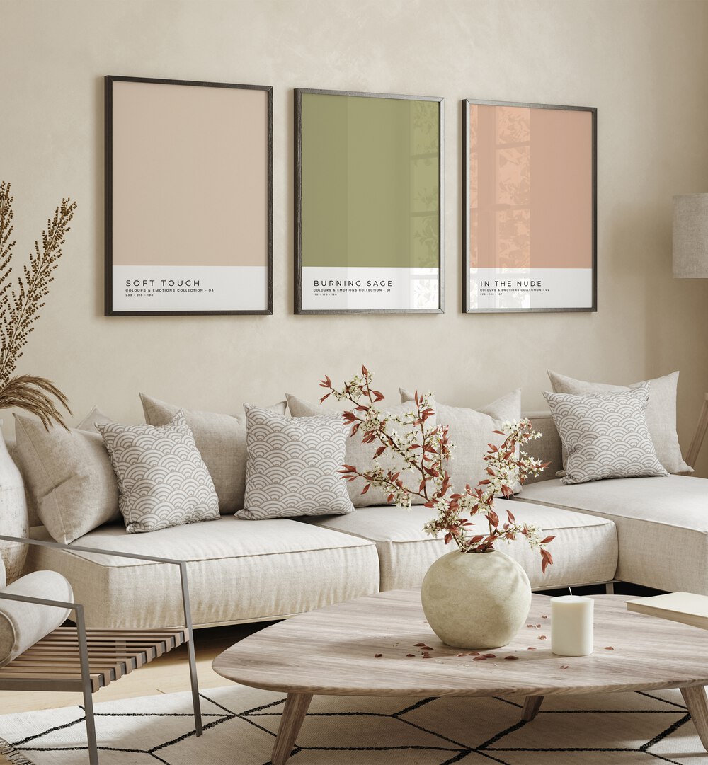 Pastel Colors Vol-I Set Of 3 Paintings in Black Plain Frame placed on a living room wall behind a sofa