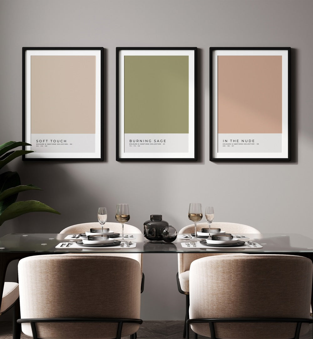 Pastel Colors Vol-I Set Of 3 Paintings in Black Plain Frame placed on a dining room wall behind a dining table