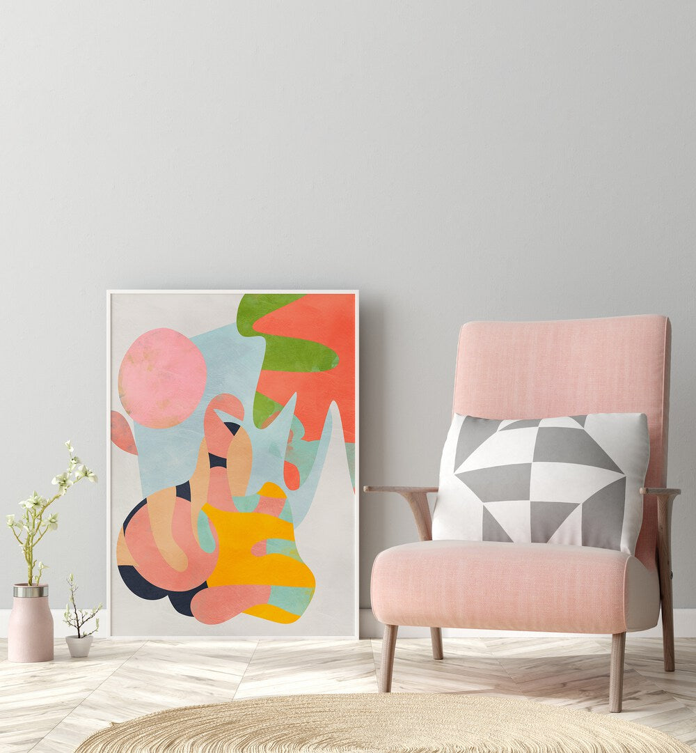 Pastel Cut Out By Ana Rut Bre Abstract Art Abstract Wall Art in White Plain Frame placed on the floor beside a chair