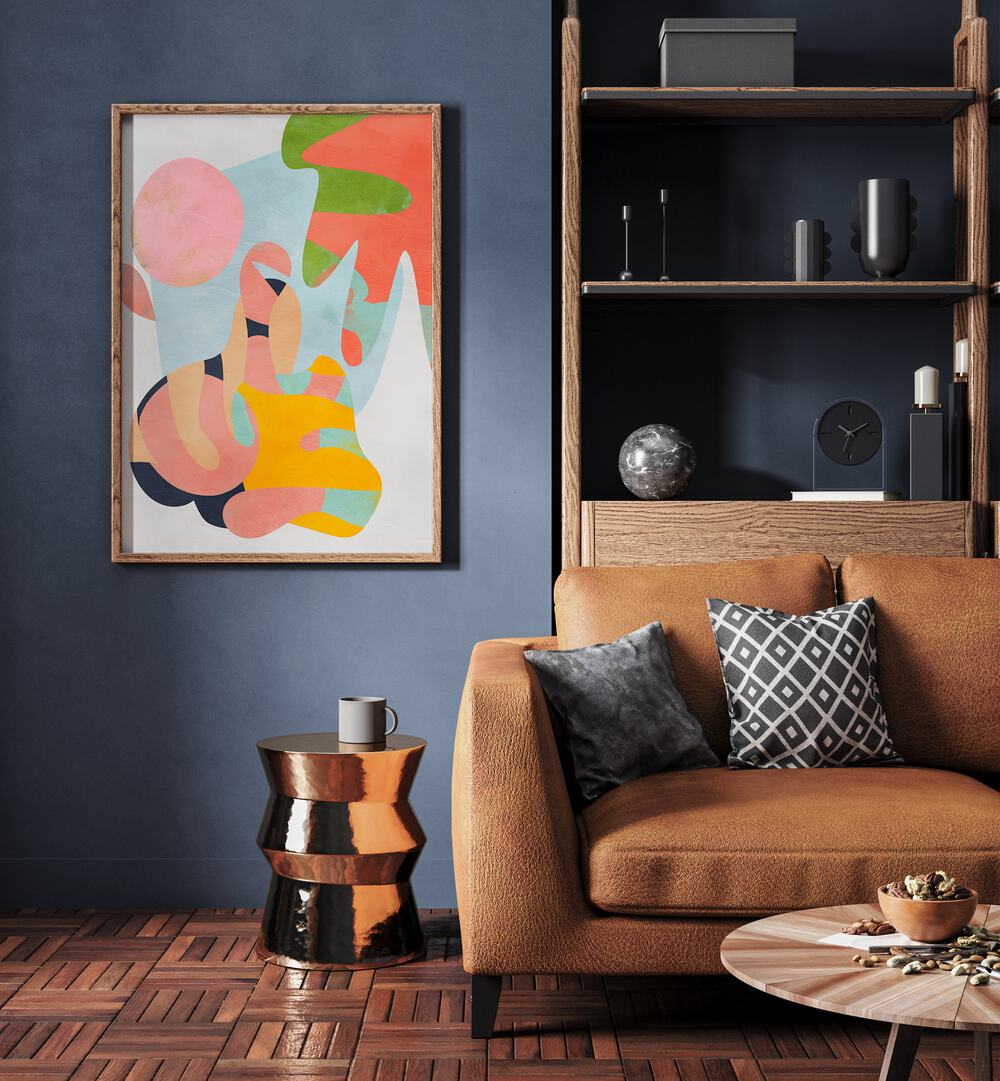 Pastel Cut Out By Ana Rut Bre Abstract Art Abstract Wall Art in Dark Wood Plain Frame placed on a wall behind a sofa