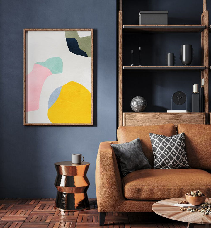 Pastel Minimal Shapes By Ana Rut Bre Landscape Art Prints in Oak Wood Plain Frame placed on a Blue Colored Wall in the Living Room