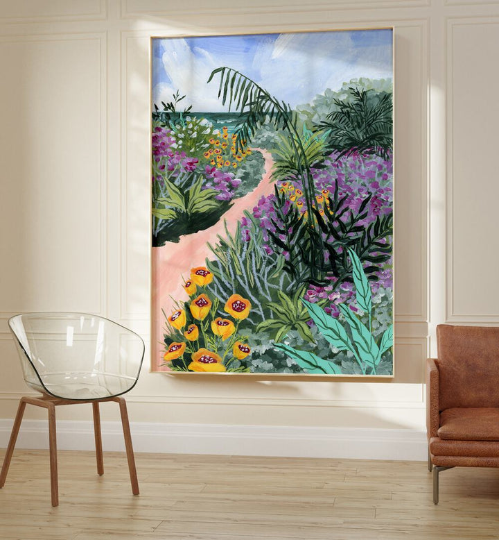 Path to the Pacific ii By Sarah Gesek Landscape Art Prints in Oak Wood Plain Frame placed on a wall between a sofa and chair