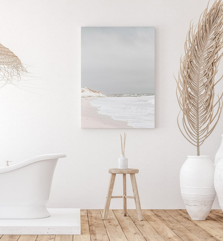 Pearlescent Momentum Beach Prints Coastal Wall Art in Gallery Wrap placed on a White Colored Wall near a Bathtub in the Bathroom