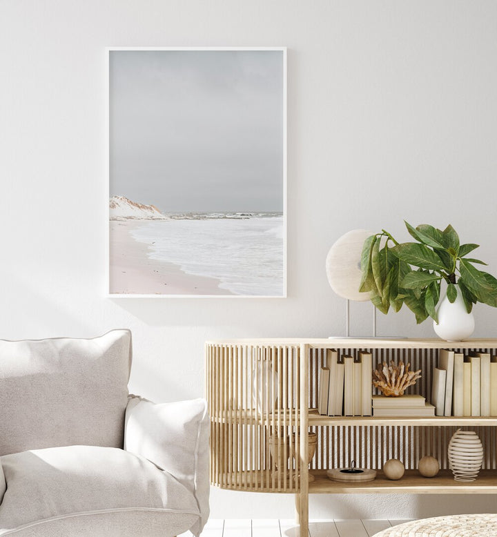 Pearlescent Momentum Beach Prints Coastal Wall Art in White Plain Frame placed on a White Colored Wall in the Drawing Room 