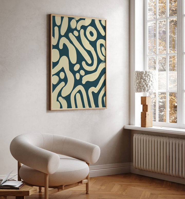 Perfrui by Yopie Studio Abstract Paintings Abstract Art Prints in Oak Wood Plain Frame placed on a wall beside a window and behind a chair