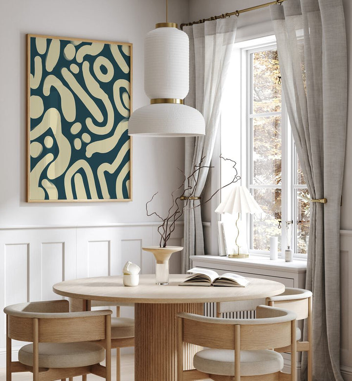 Perfrui by Yopie Studio Abstract Paintings Abstract Art Prints in Oak Wood Plain Frame placed on a wall in a dining room area beside a window and behind a dining table