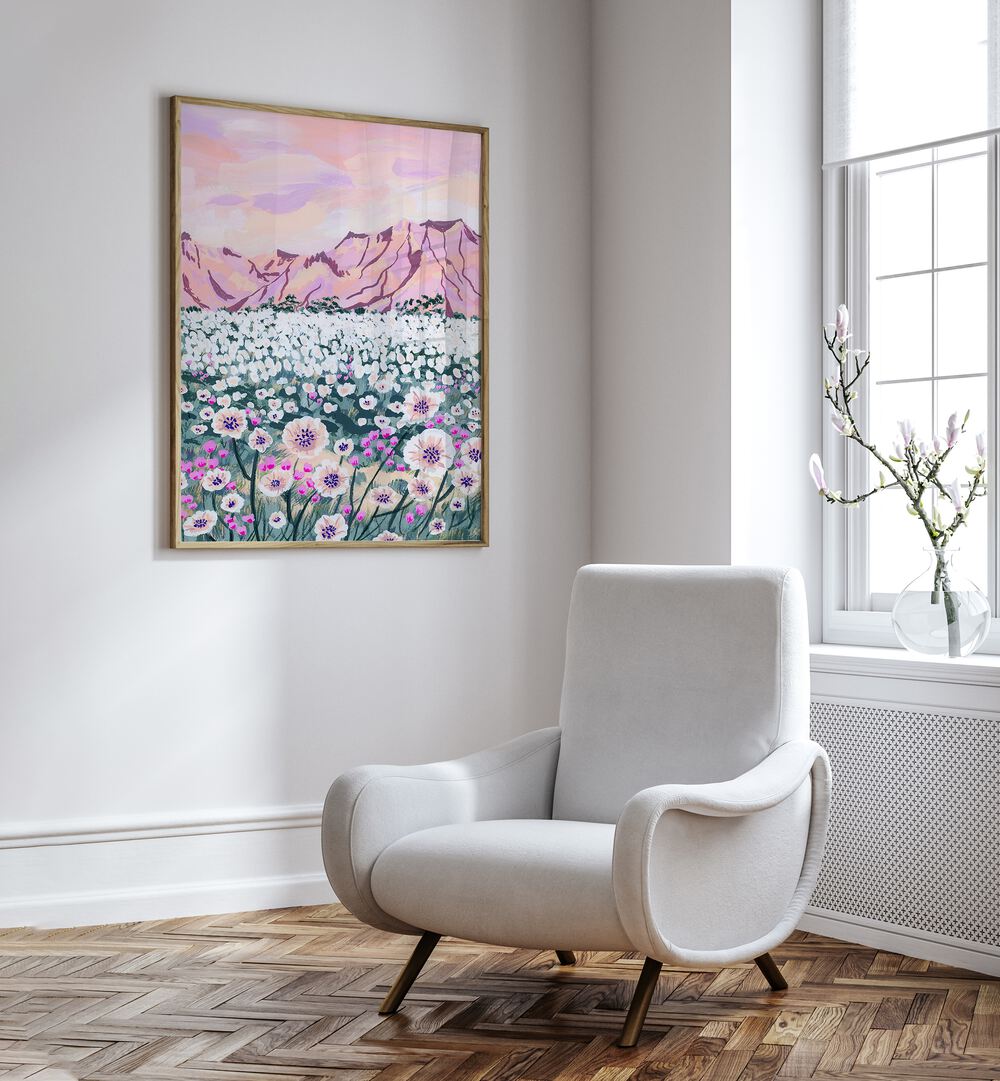 Pink Desert By Sarah Gesek Landscape Art Prints in Oak Wood Plain Frame placed on a wall behind a sofa and beside a window