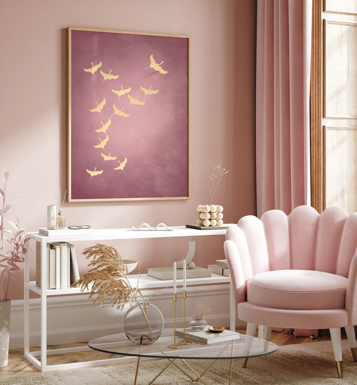 Pink Flying Cranes By Aureous Wildlife Art Prints in Oak Wood Plain Frame placed on a Pink Colored Wall above a Console Table in the Drawing Room