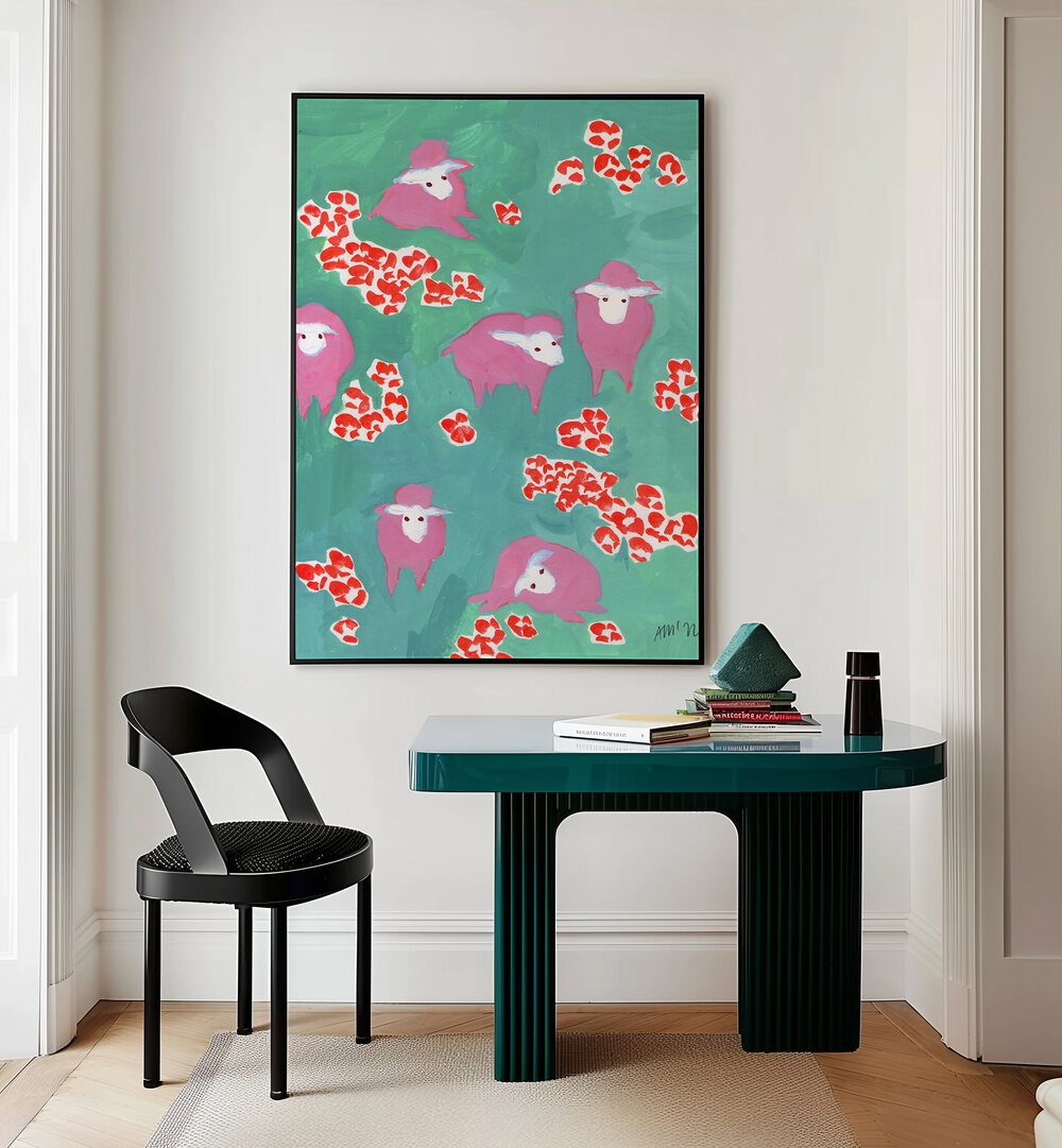 Pink Sheep On A Green Meadow By Ania Zwara Botanical Art Prints Floral Paintings in Black Plain Frame placed on a Cream Colored Wall near a Table in a Workspace in the Drawing Room