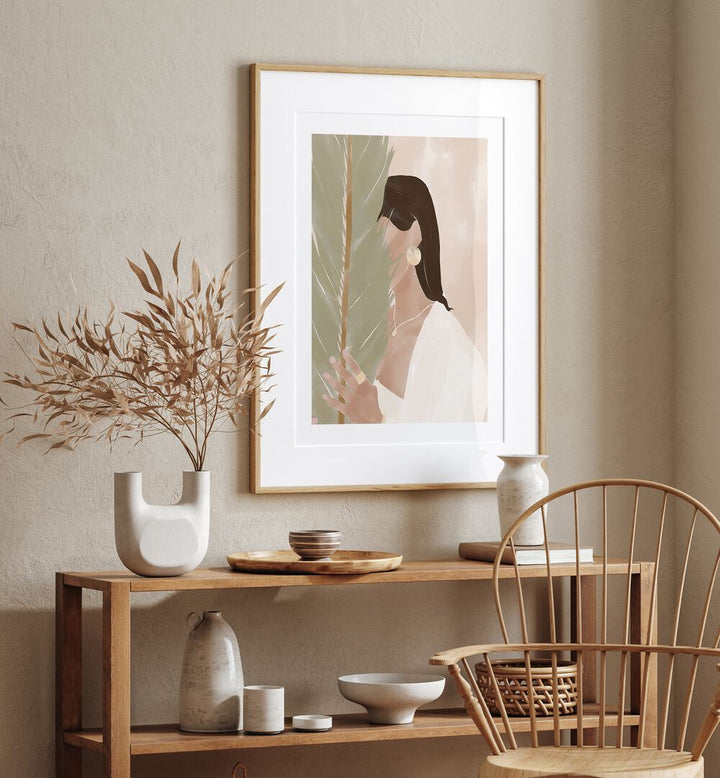 Plant Mom By Ivy Green Women Illustration Paintings in Oak Wood Frame With Mount on a beige wall above a table