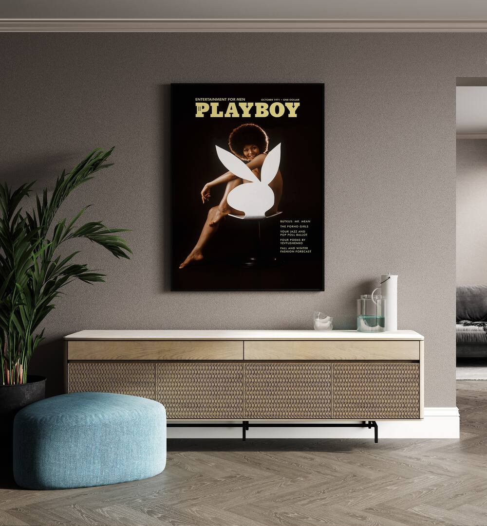 Playboy  Women Illustrations paintings in Black Plain Frame on a wall placed behind a console table