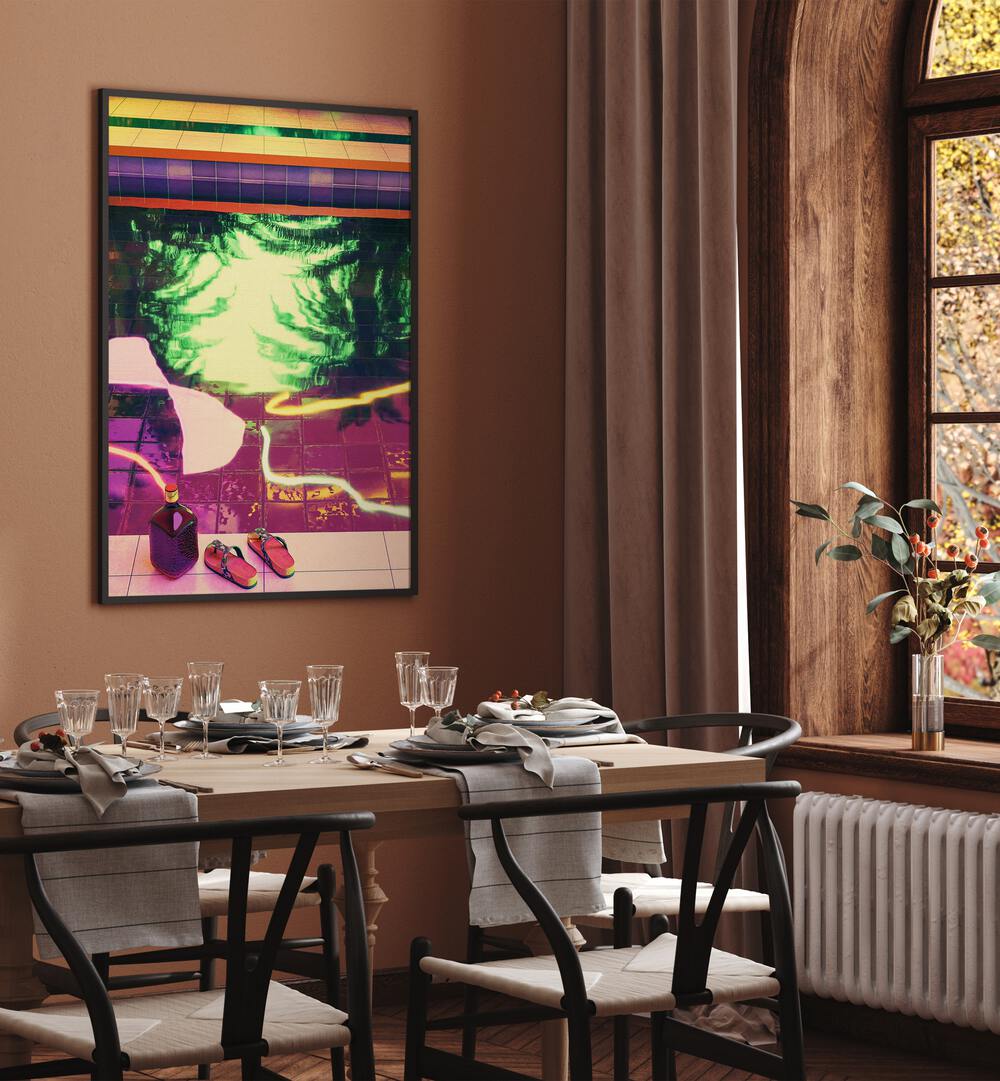 Poolside Ii By Cosmo Zach Surreal Art Prints Surrealism in Black Plain Frame placed on a wall behind a dining table 