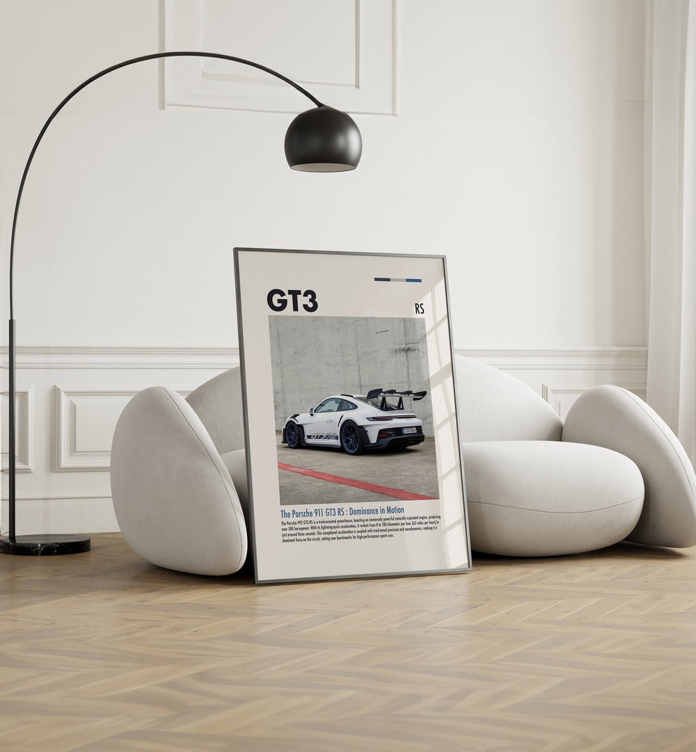 Porsche 911 GT3 RS Car Posters Automotive Wall Art Prints in Black Plain Frame placed on the floor near a White Sofa in the Living Room