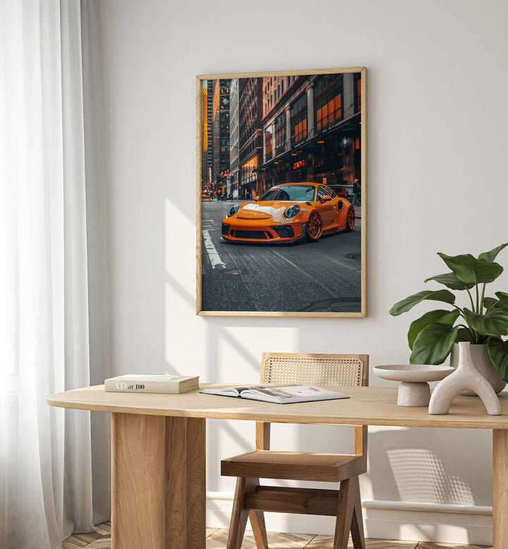 Revamp your decor with PORSCHE CREATIVE V, CAR POSTERS showcasing a stunning orange Porsche in an urban setting.