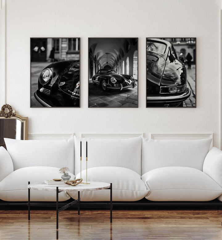 Porsche Set Set Of 3 Paintings in Black Plain Frame placed on white wall behind a white sofa